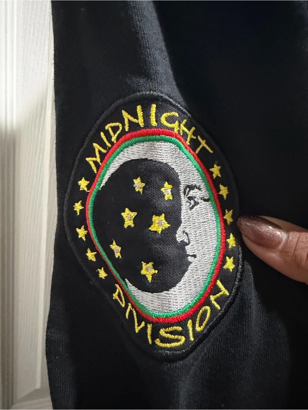 Marauders Black Crewneck Sweater with Striped Hem